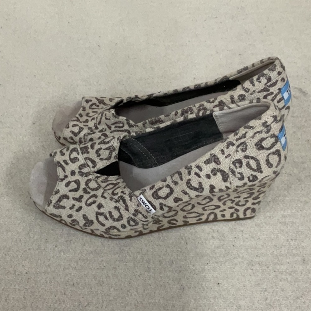 EUC woman’s TOMS slip on wedge shoes